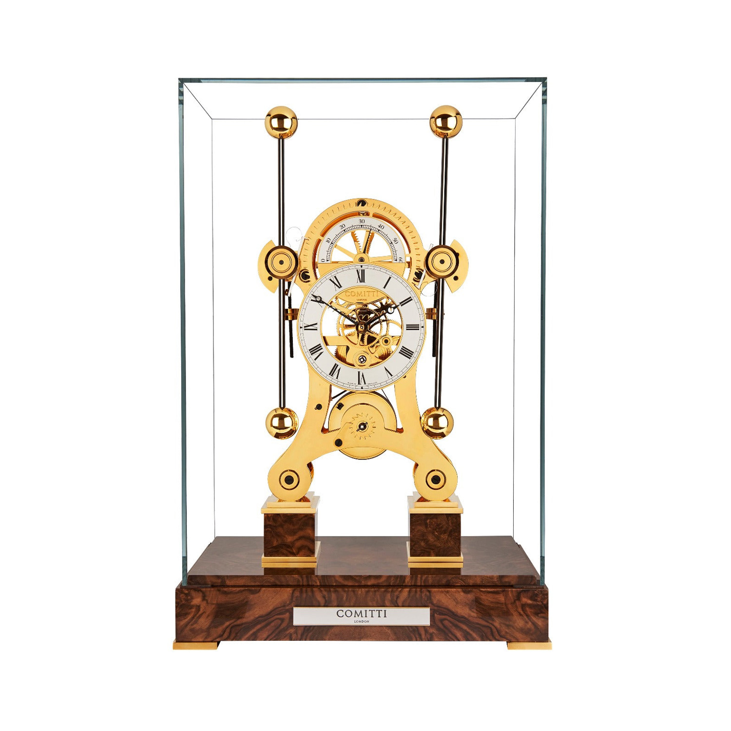Comitti The Navigator Gold Nussbaum Tischuhr unter Glashaube mit edlem Nussbaum-Sockel und vergoldetem Uhrwerk.